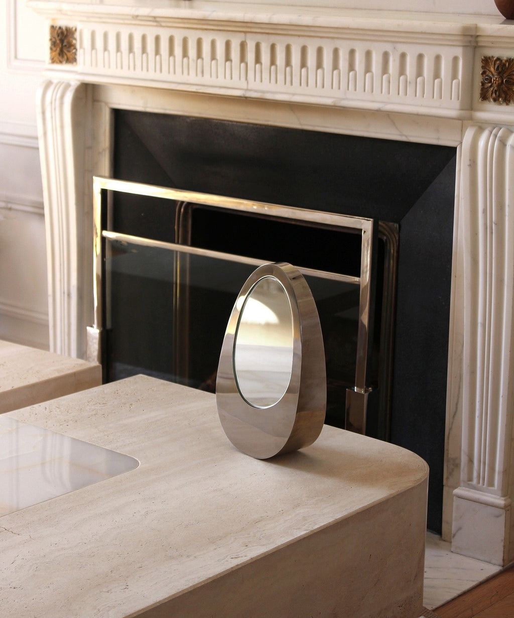 Side view of Ovio luxury marble mirror, Italian furniture design for elegant interior decoration