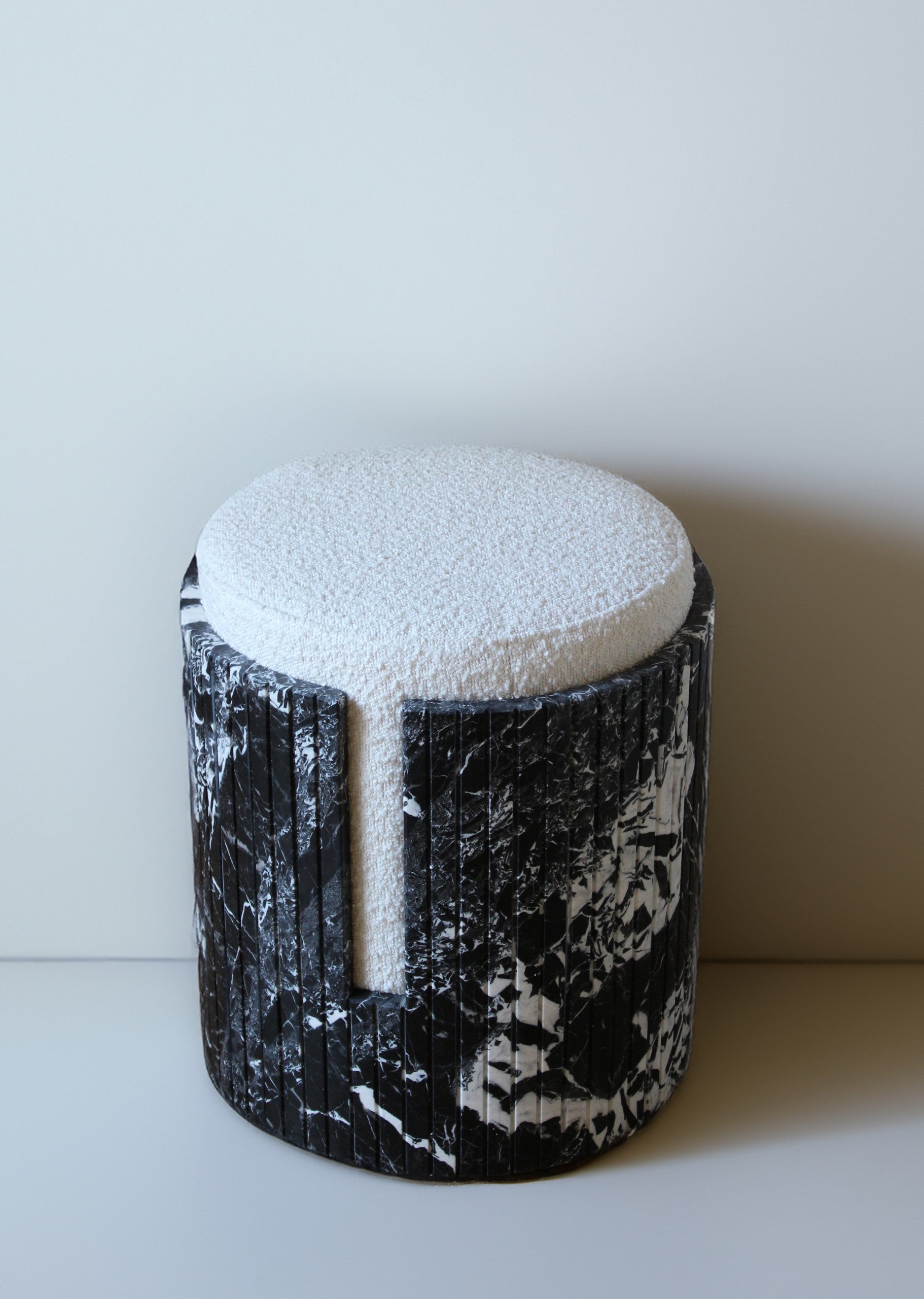Grand Antique marble Dolce stool profile view highlighting elegant curved silhouette Italian design