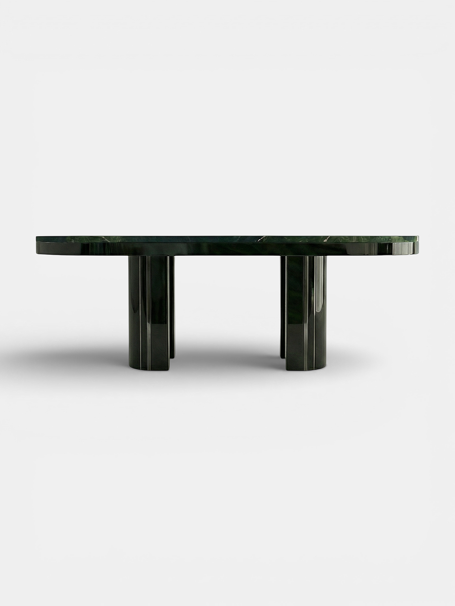 Gio black lacquered avocado marble table alternate angle highlighting mixed material luxury design