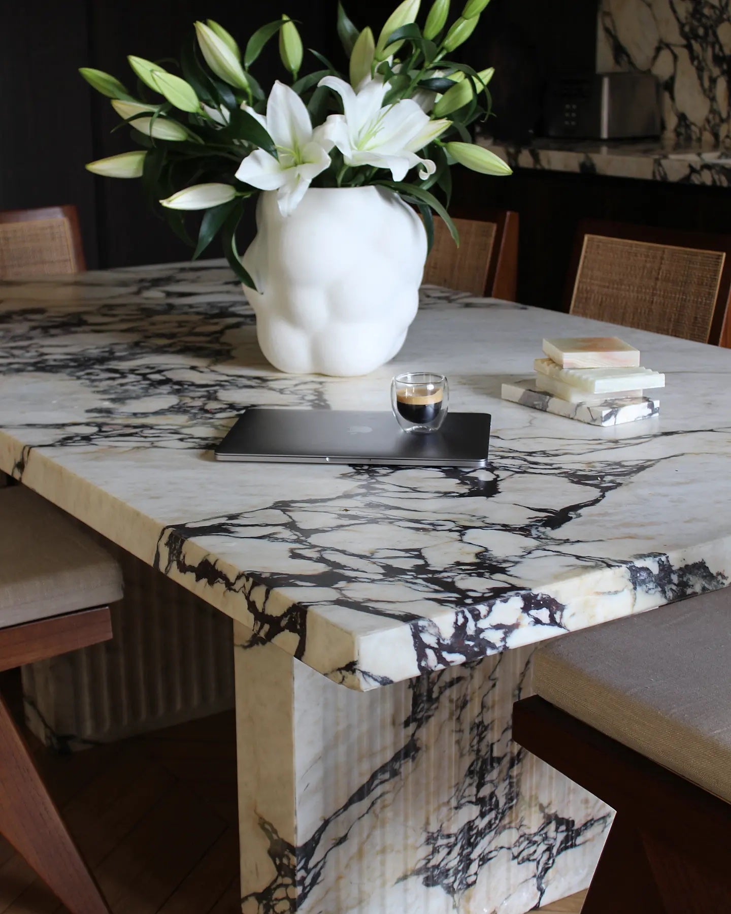 Aura dining table in premium Calacatta Viola marble - contemporary Italian design with purple accents