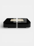 Square black and ivory onyx Baci table front view - Italian luxury marble furniture with contrast