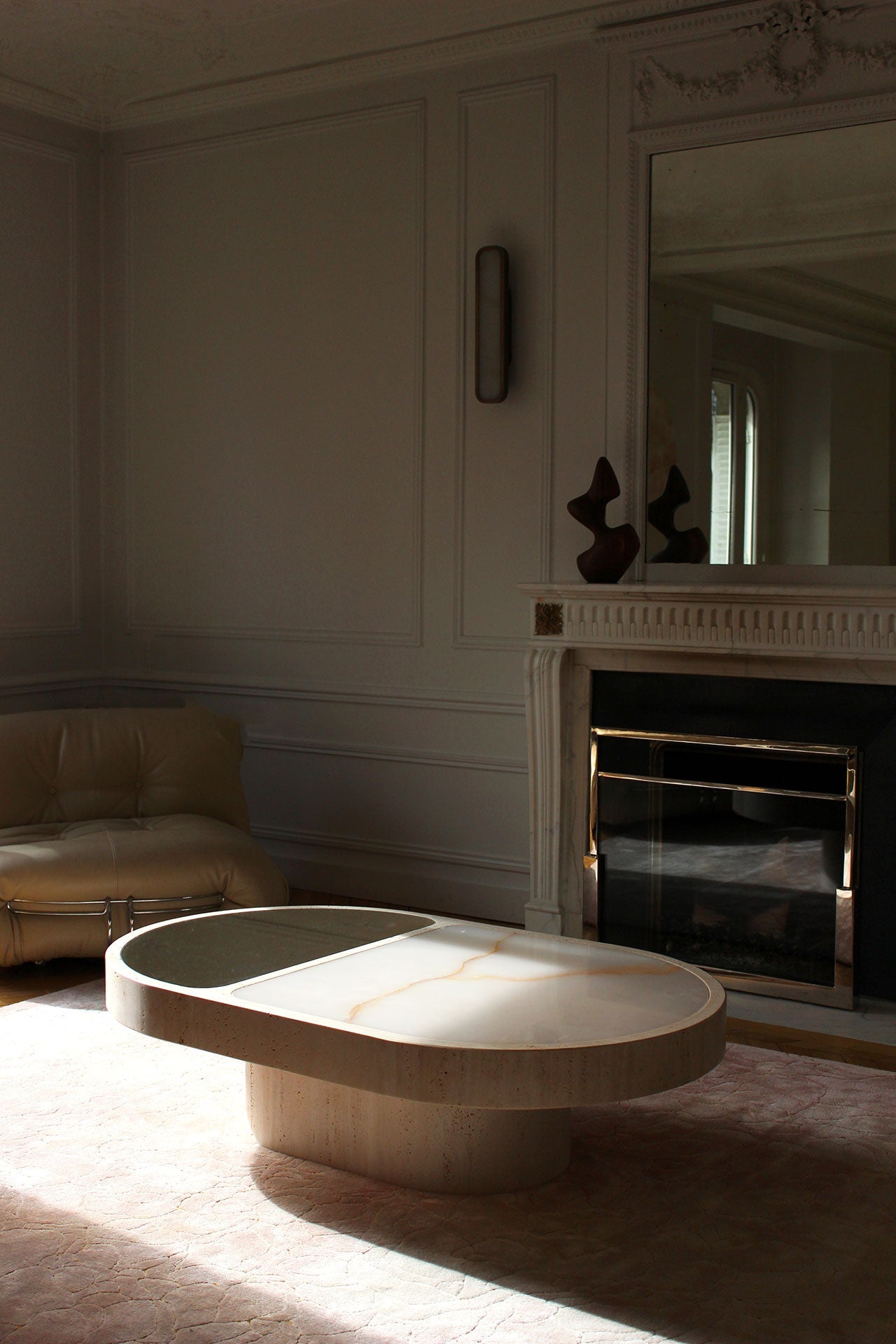 Backlit shell onyx marble table showcasing stone's translucent properties - premium Italian furniture