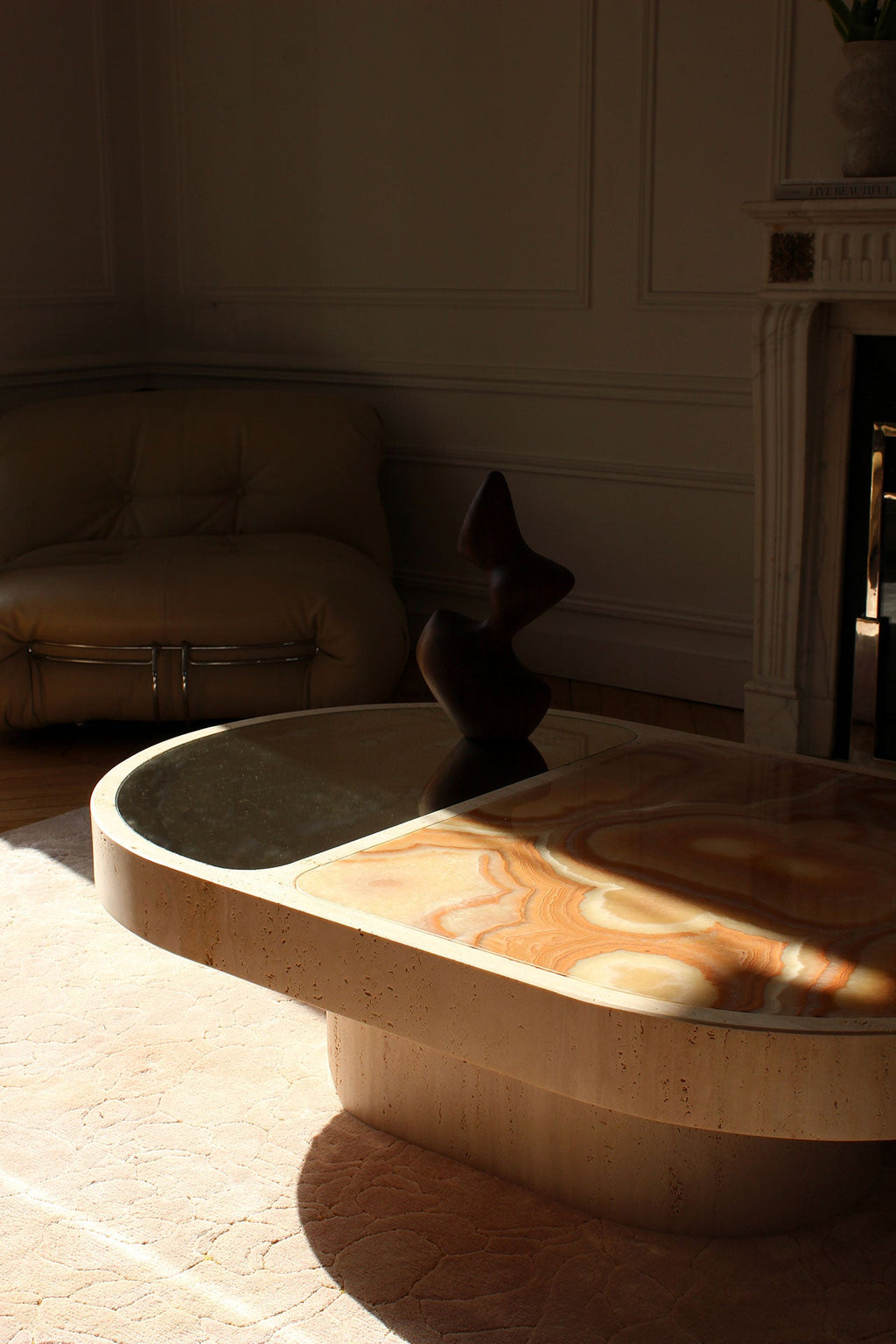 Detailed view of sixties onyx marble surface texture on Italian travertine base coffee table