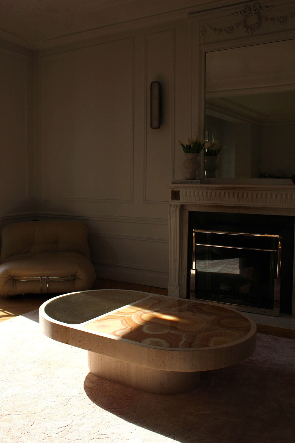 Sunlit sixties onyx marble coffee table revealing natural stone's golden tones - luxury Italian furniture