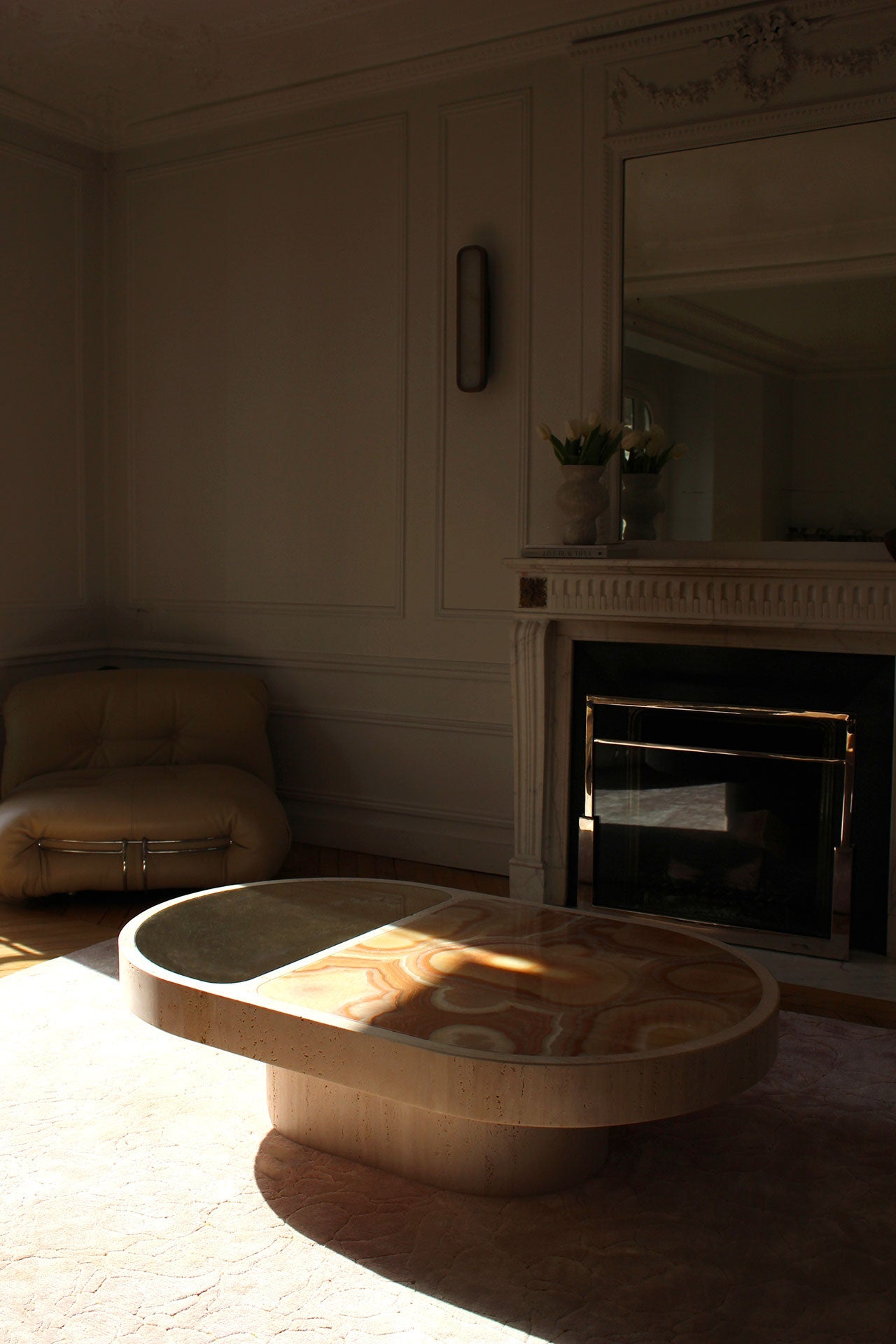 Sunlit sixties onyx marble coffee table revealing natural stone's golden tones - luxury Italian furniture