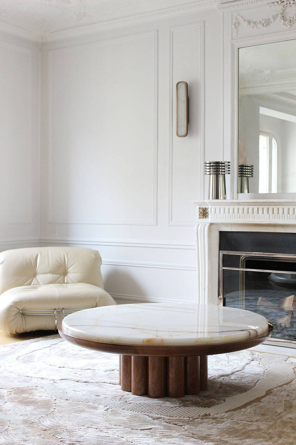 Handcrafted shell onyx marble and wood coffee table close-up - premium Italian furniture detail