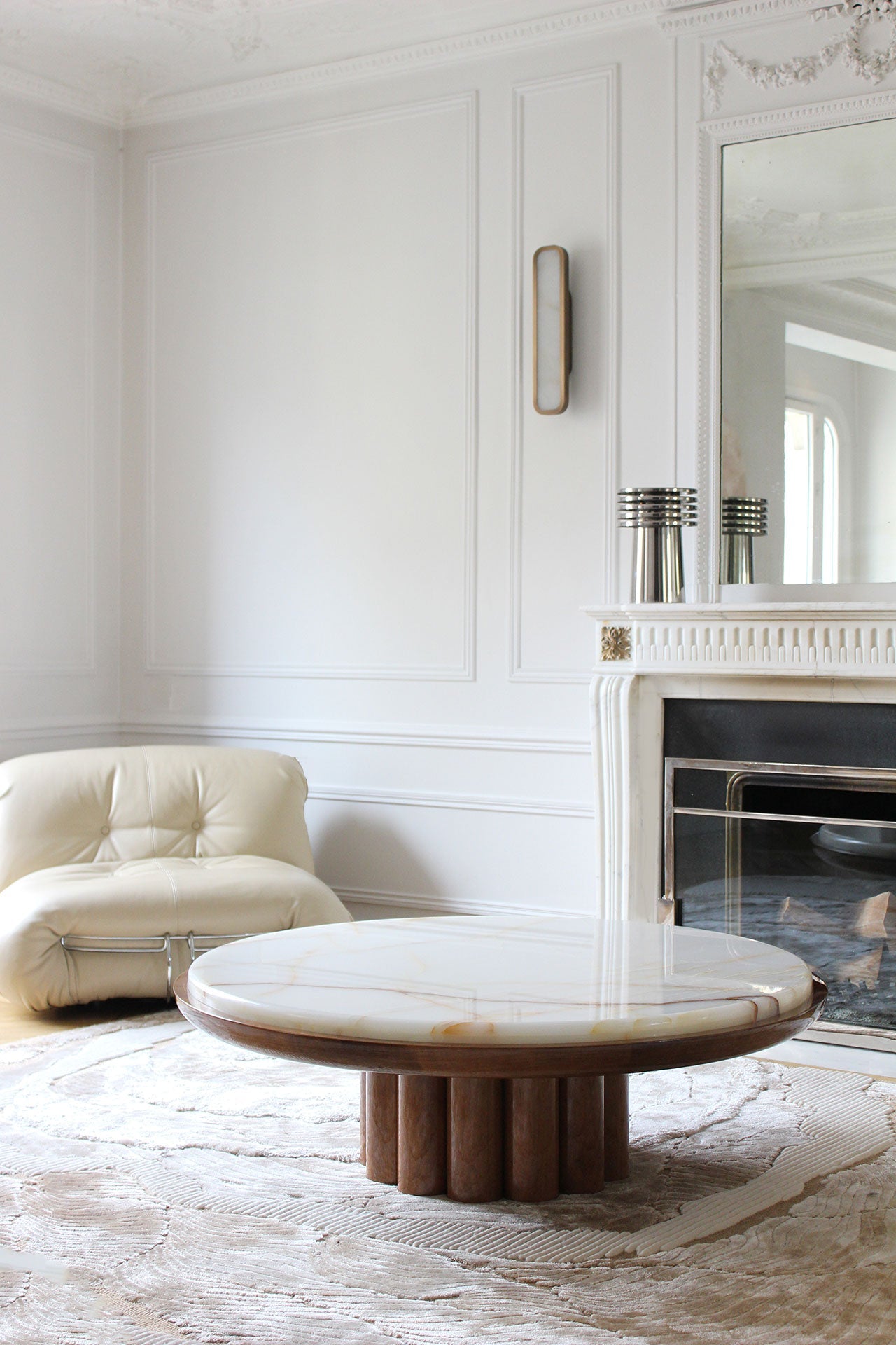 Handcrafted shell onyx marble and wood coffee table close-up - premium Italian furniture detail