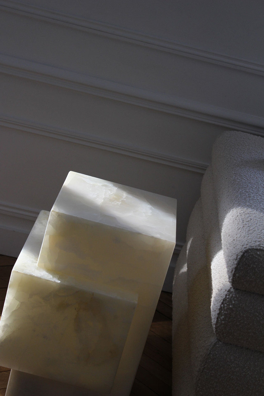 White onyx marble table detailed view of natural stone veining, Italian luxury dining furniture