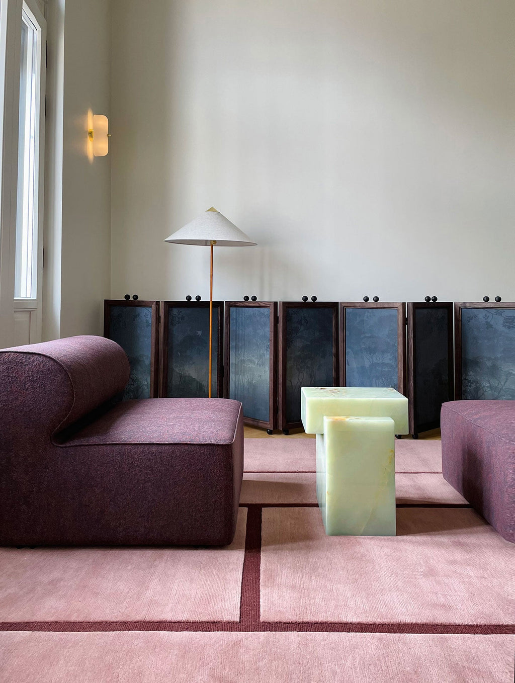 Green onyx coffee table styled in modern interior setting showcasing luxury marble furniture design