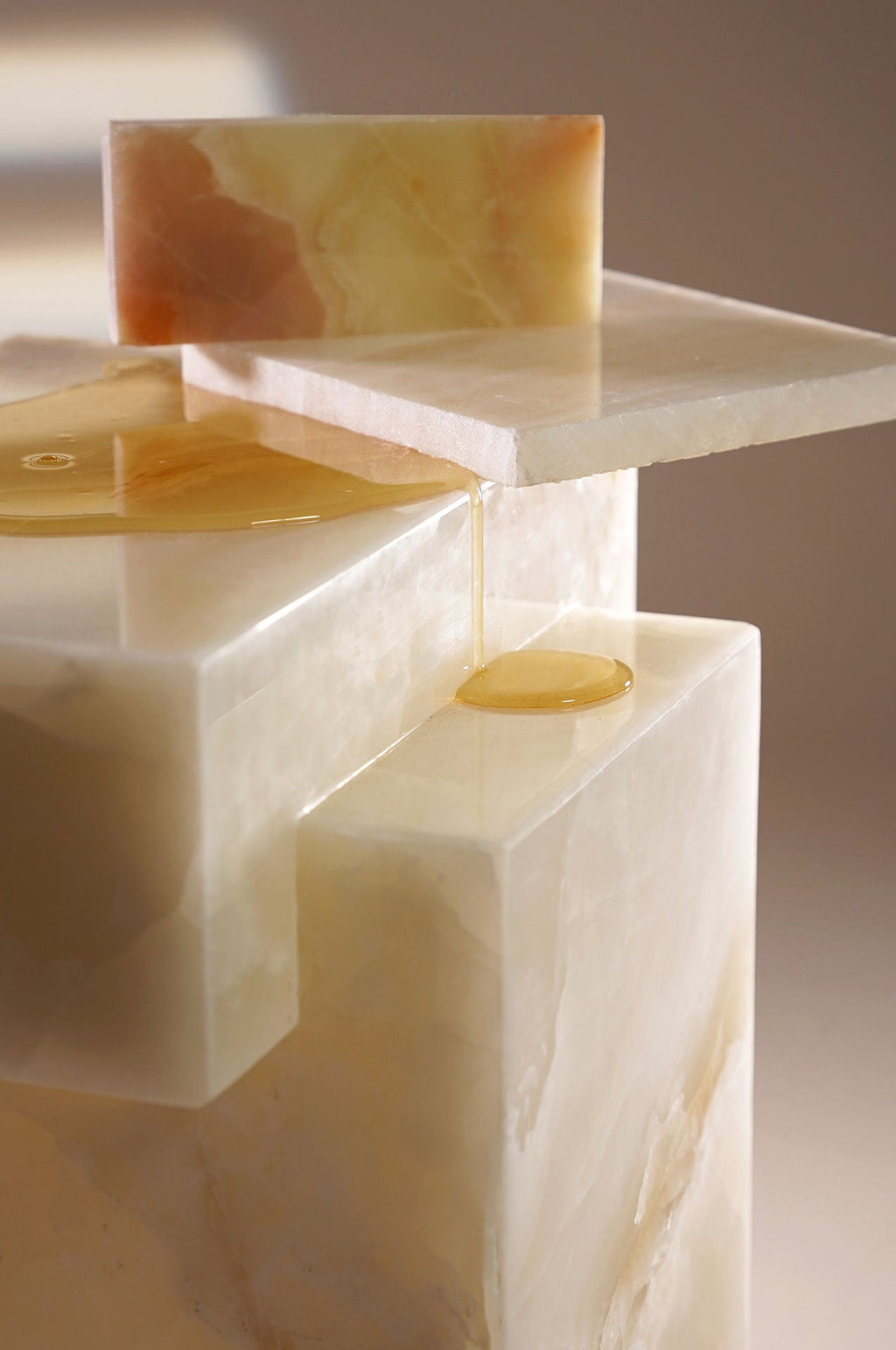 Gaia white onyx marble table close-up detail showing natural stone veining and surface texture