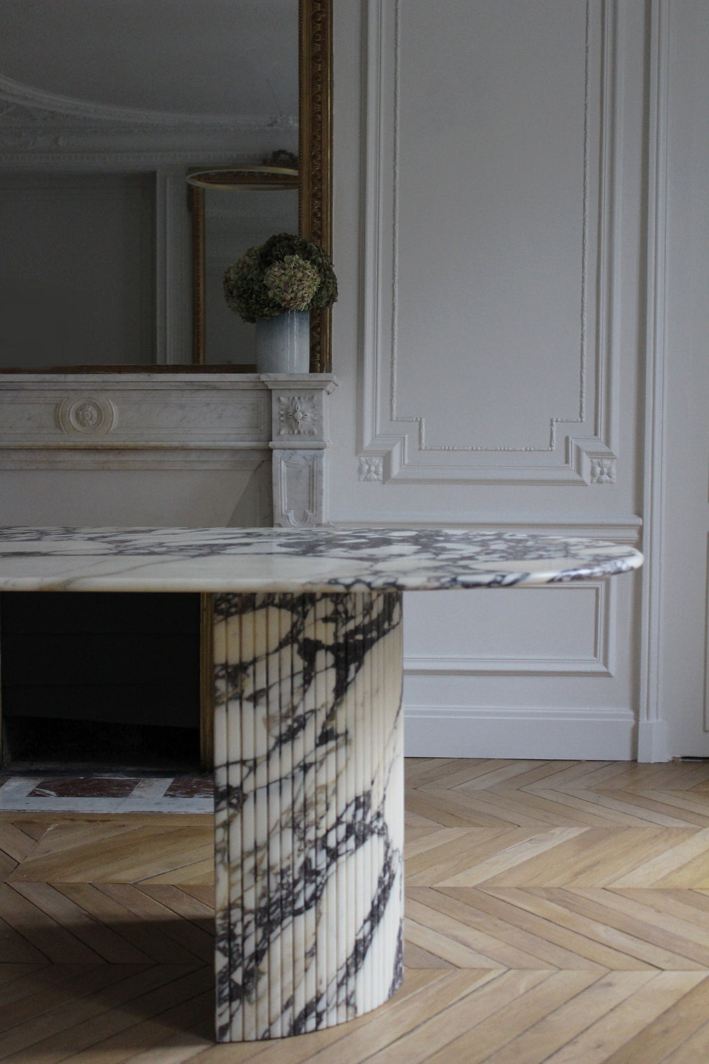 Luna Calacatta Viola marble dining table detail shot showing natural purple marble veining texture