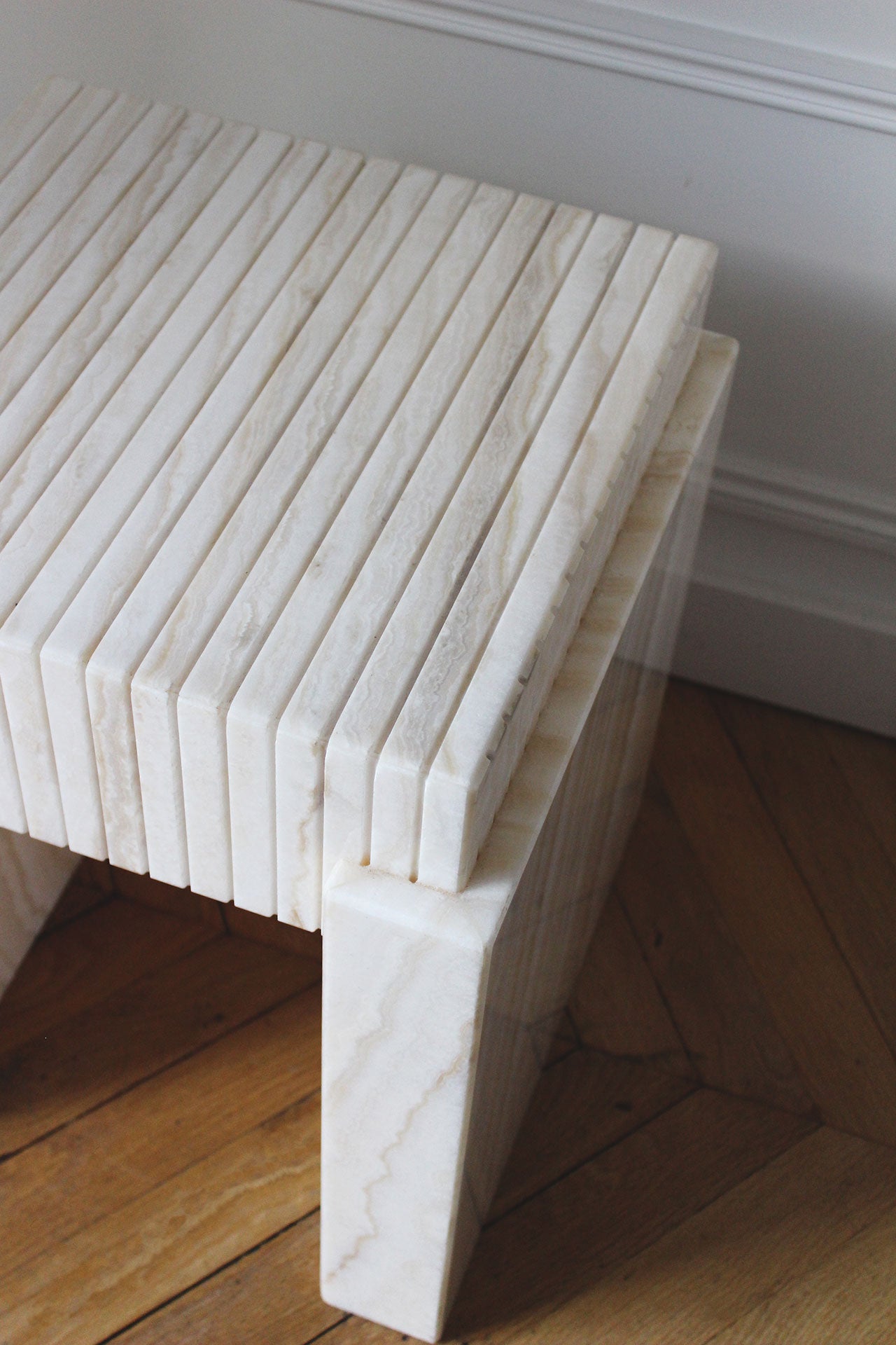 Gina ivory onyx marble stool detail view showcasing natural stone veining and texture finish