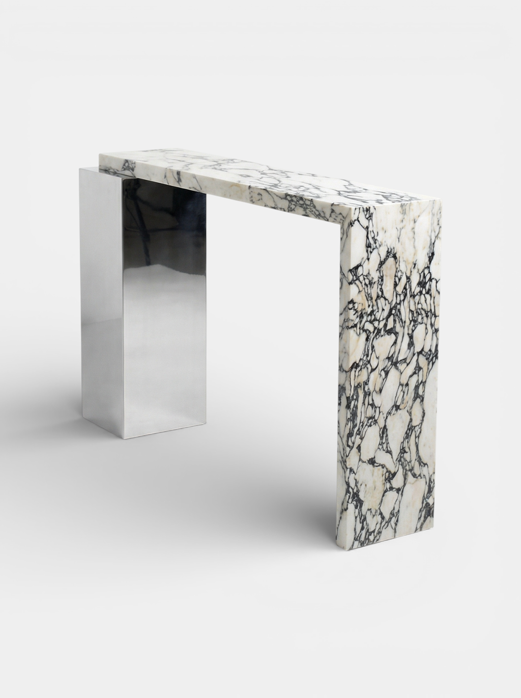 Right side view of Jill console in Calacatta Viola marble highlighting Italian craftsmanship and design