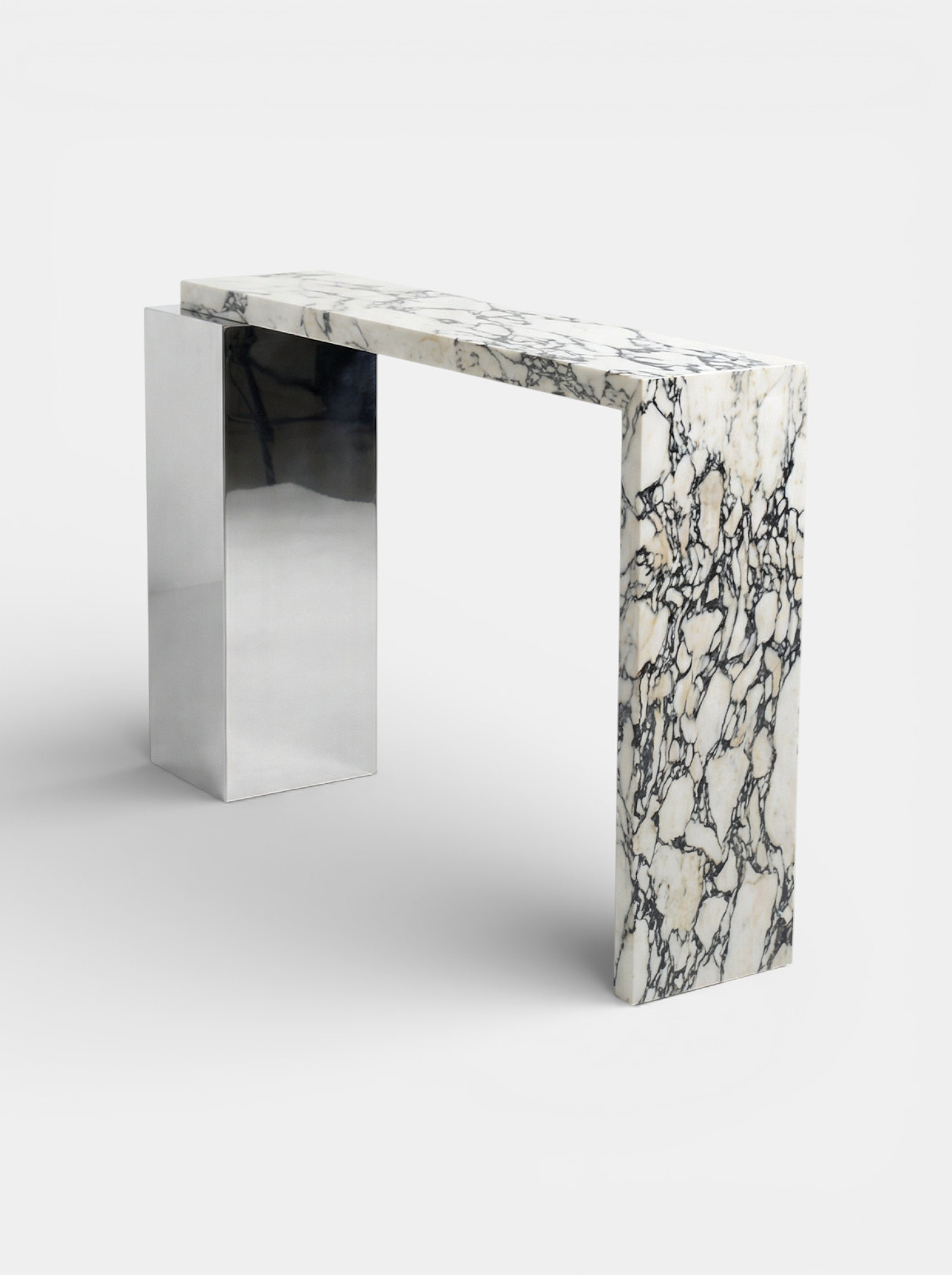 Right side view of Jill console in Calacatta Viola marble highlighting Italian craftsmanship and design