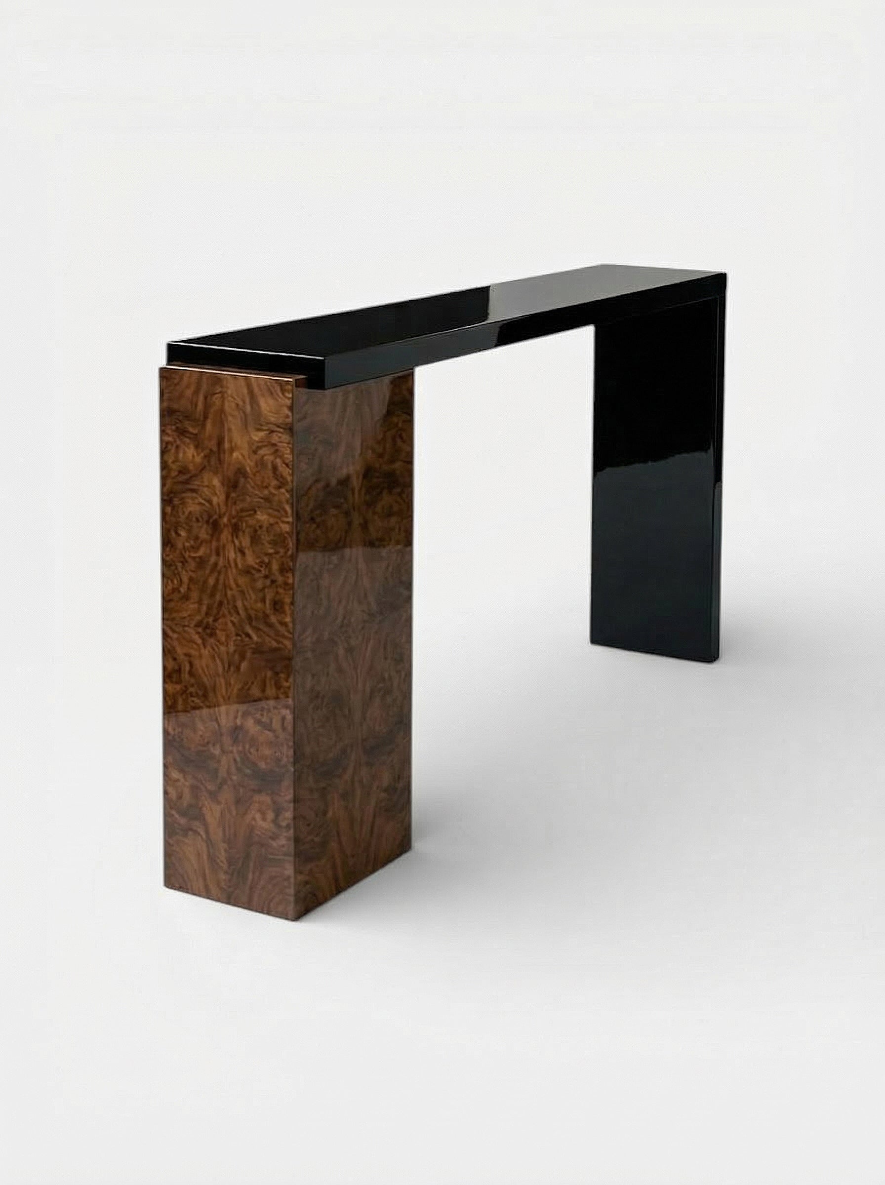 Front view Jill black marble and burl wood console displaying contrasting materials and modern design