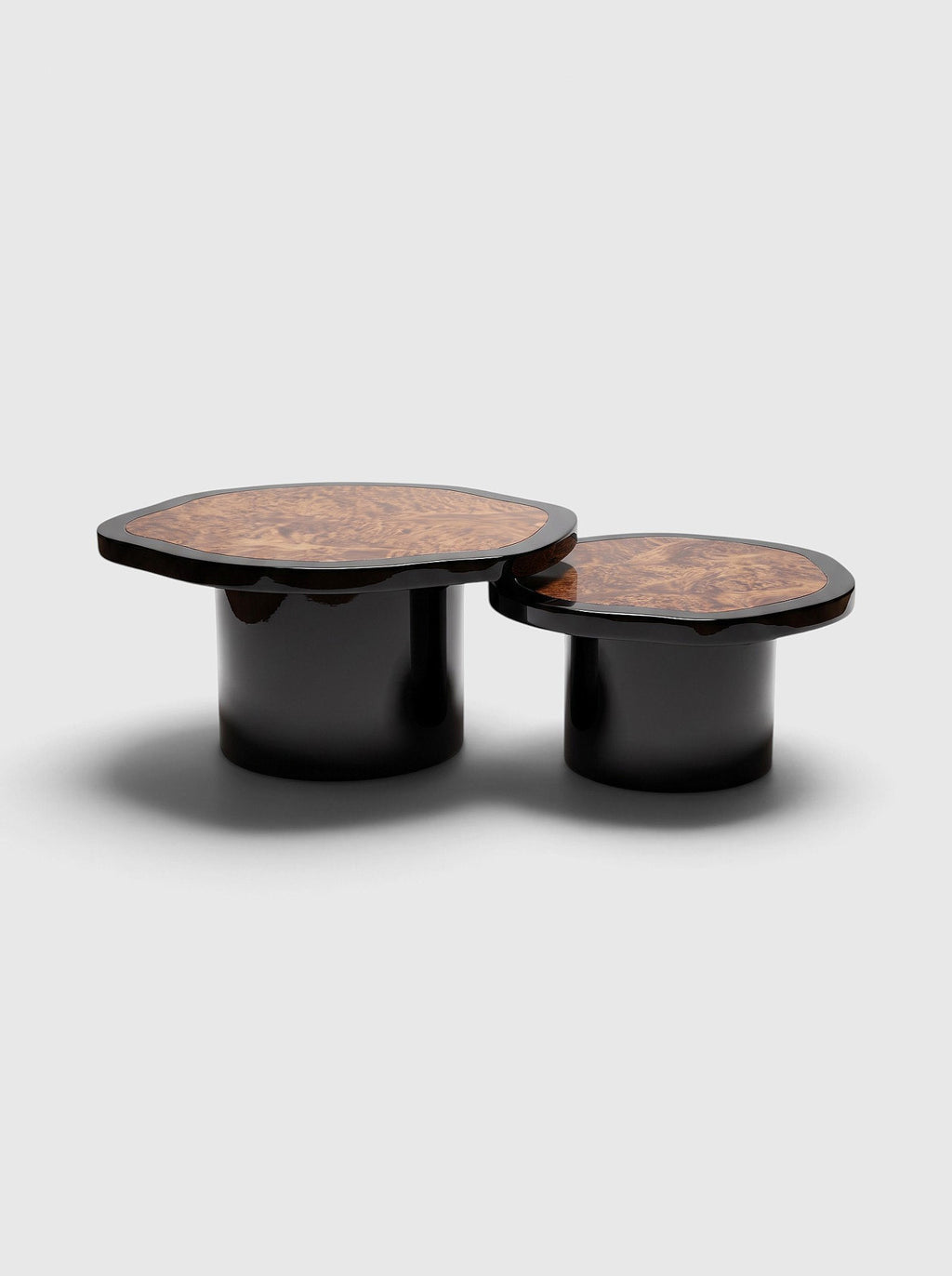 MARBERA Joan Duo coffee tables with high-gloss black lacquered bases and dark burl wood tops