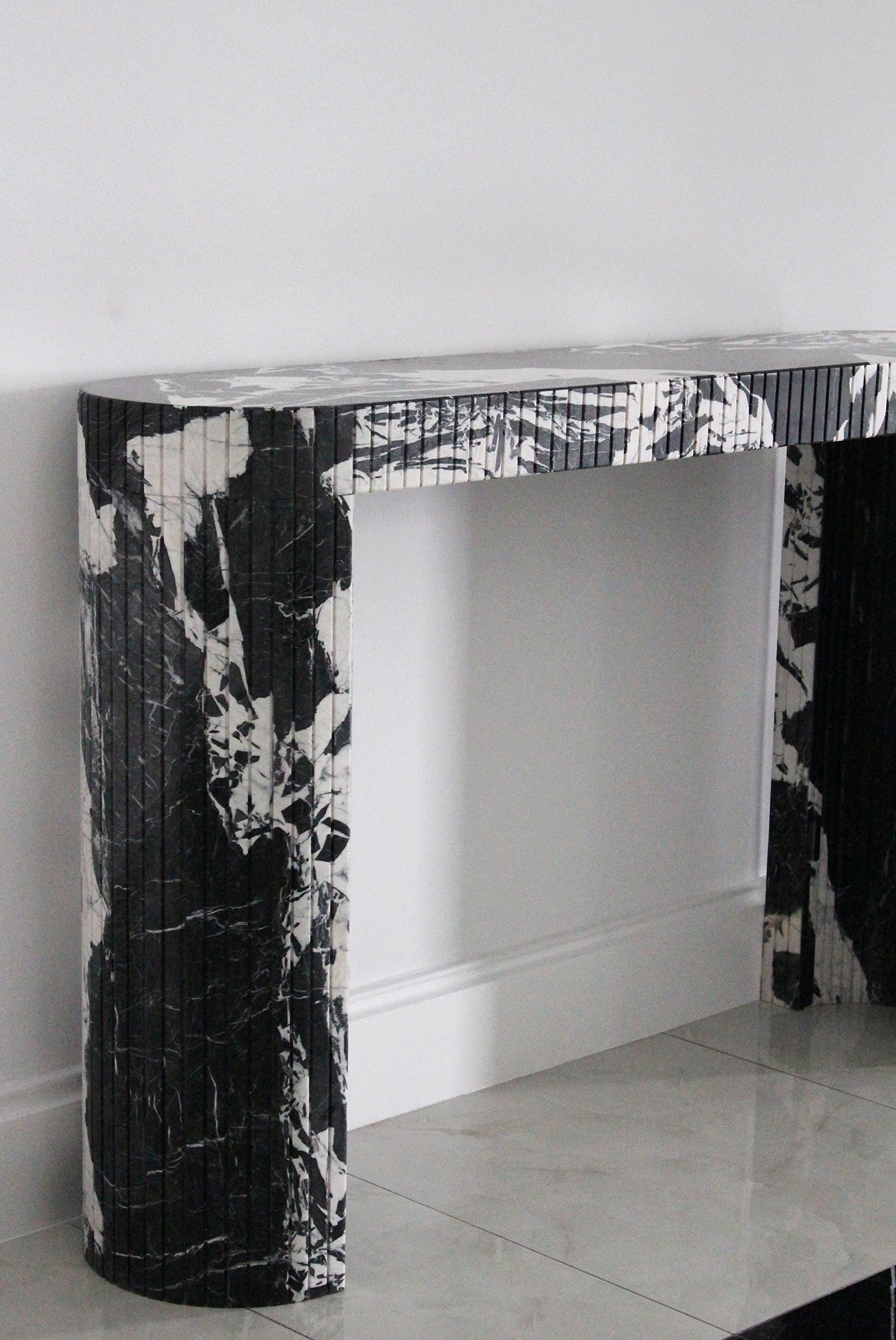 Luna Grand Antique marble console lifestyle shot - elegant Italian dark marble furniture piece
