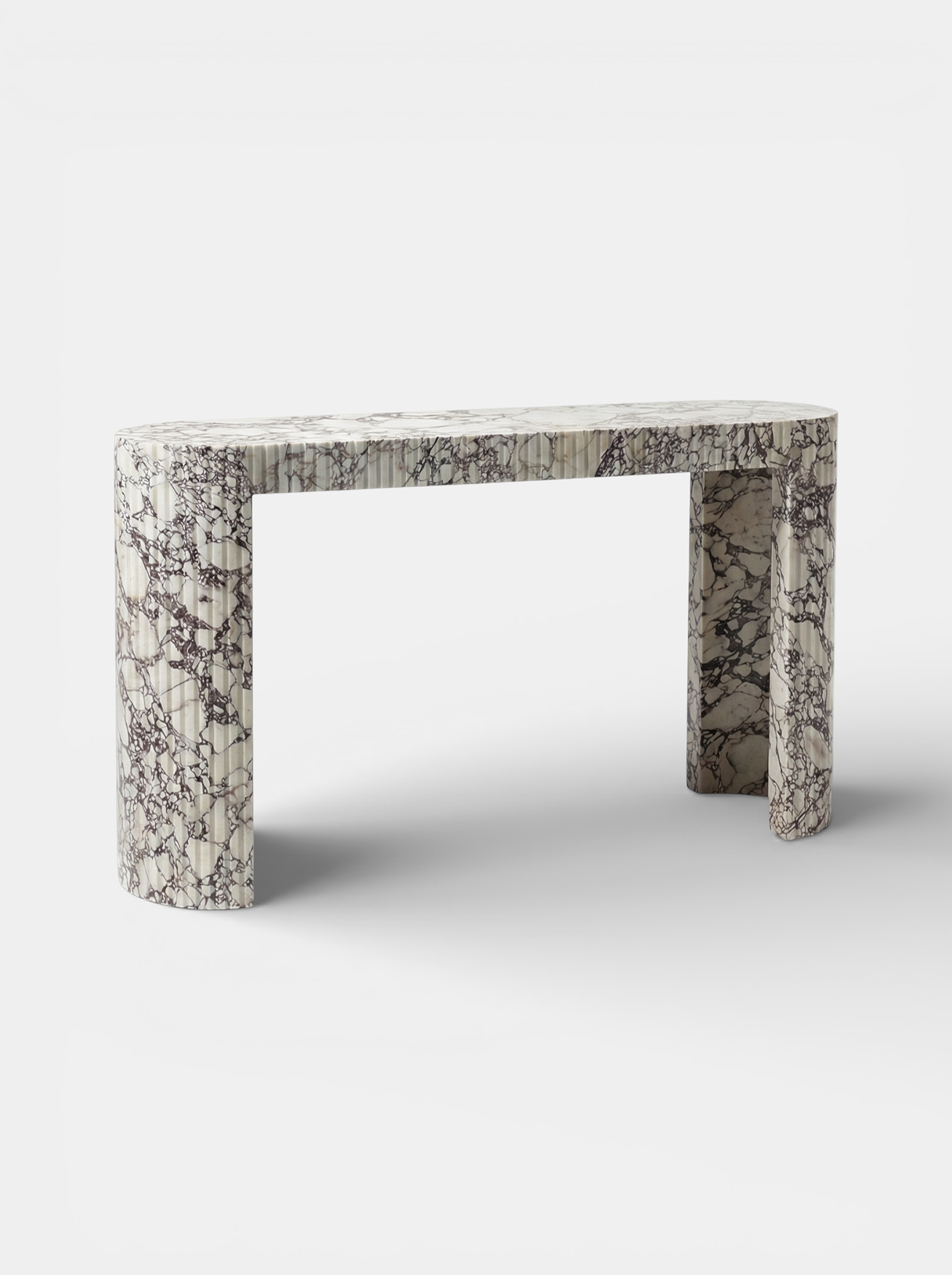 Luna Calacatta Viola marble console three-quarter view showing natural purple marble veining patterns