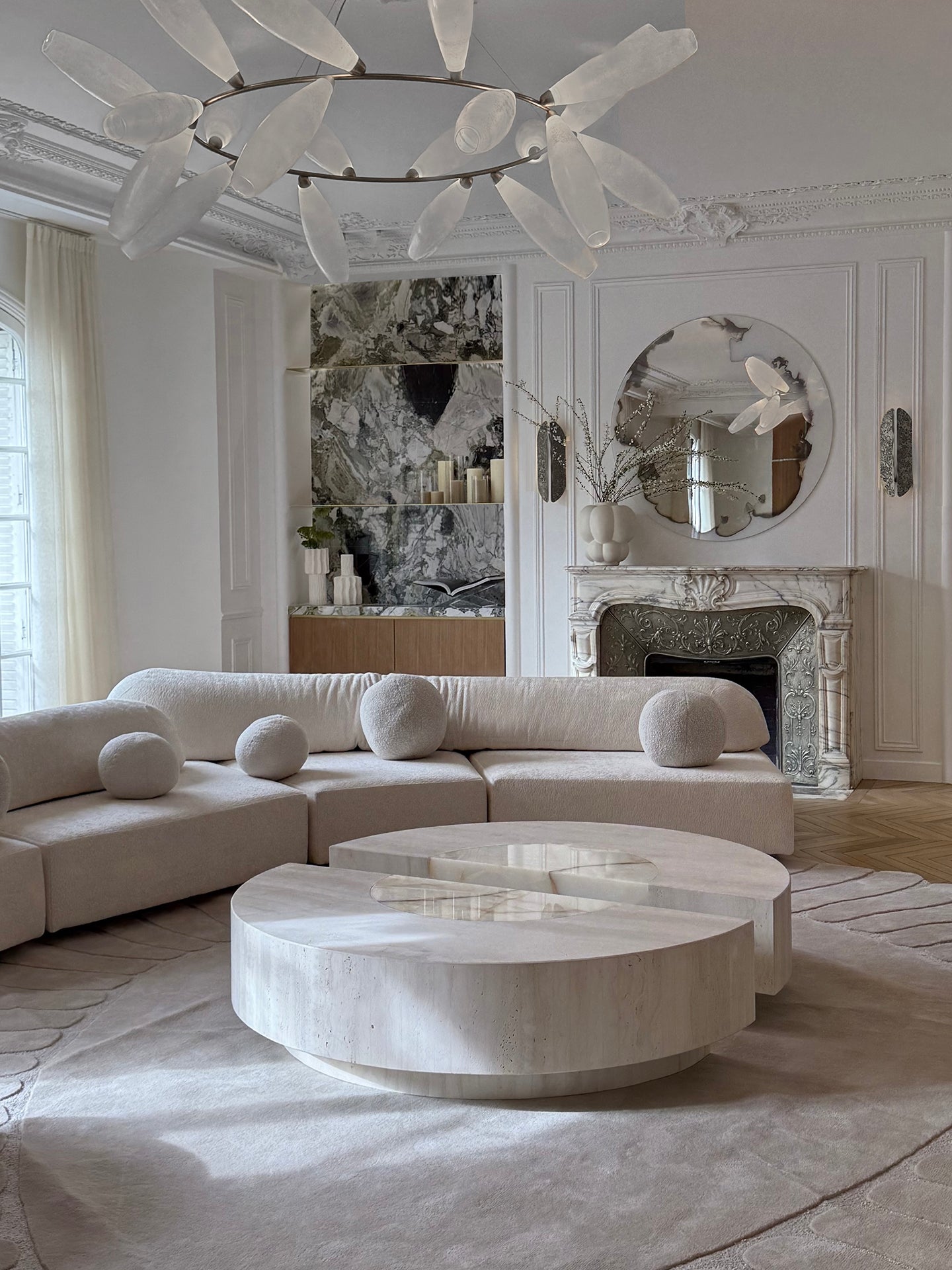 Baci round coffee table in marble - elegant Italian design with natural stone patterns and textures