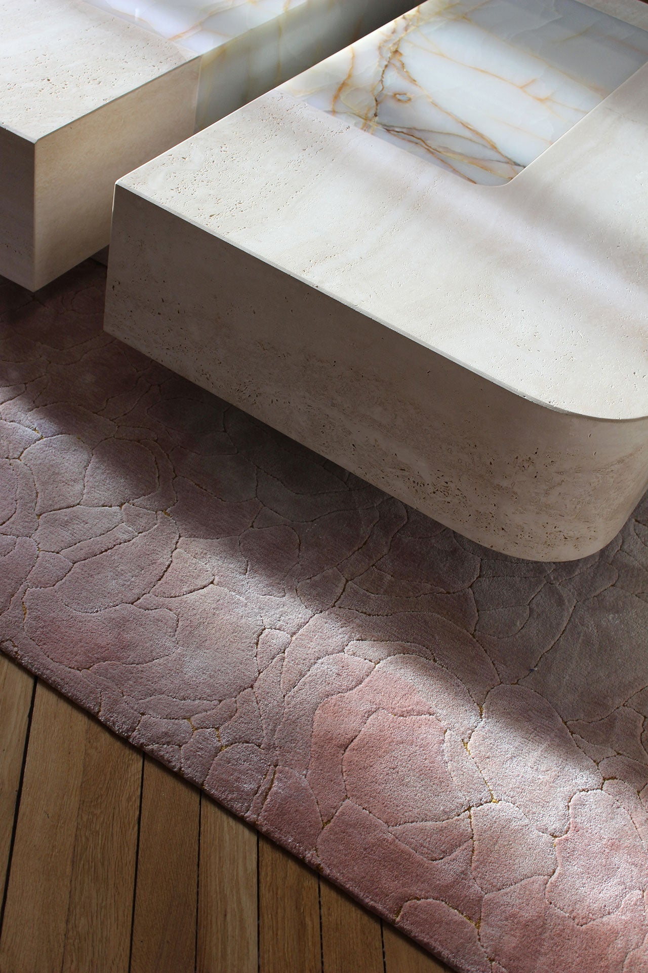 Premium Baci marble coffee table angle view - Italian design excellence in natural stone