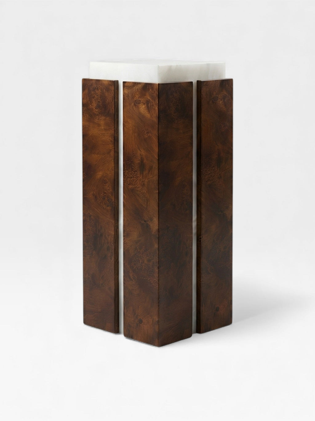 Three-quarter view of Como plinth with brown wood and white onyx combination - Italian luxury furniture