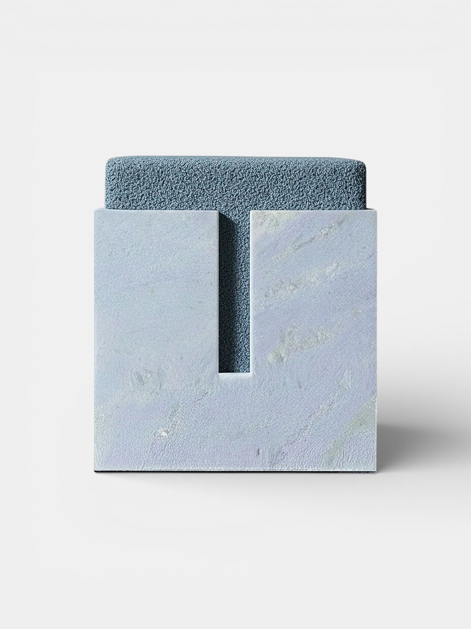 Italian blue sky marble stool with azure veining, luxury handcrafted stone furniture sculptural form