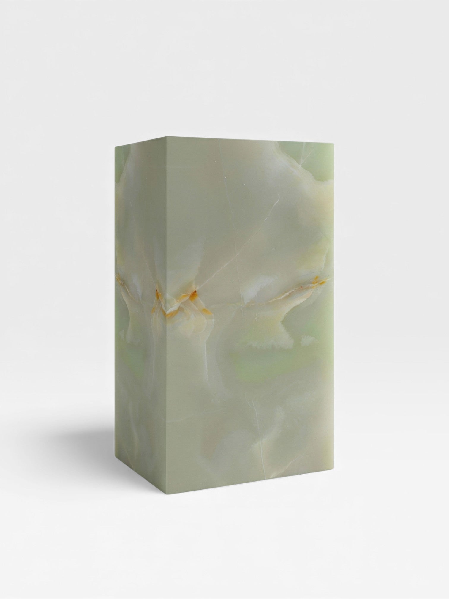 Green onyx plinth three-quarter view - handcrafted Italian marble display stand with clean lines