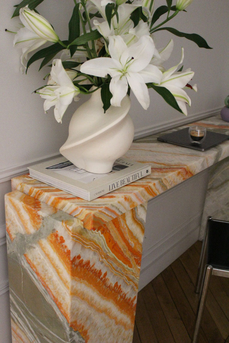 Van Gogh inspired Rainbow Onyx Jill console displaying artistic marble patterns and luxury design