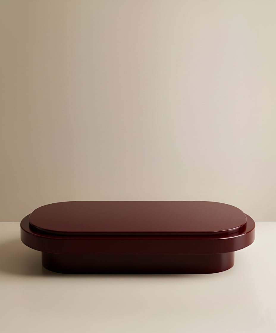 Mirage bordeaux wood coffee table in elegant interior setting with warm lighting