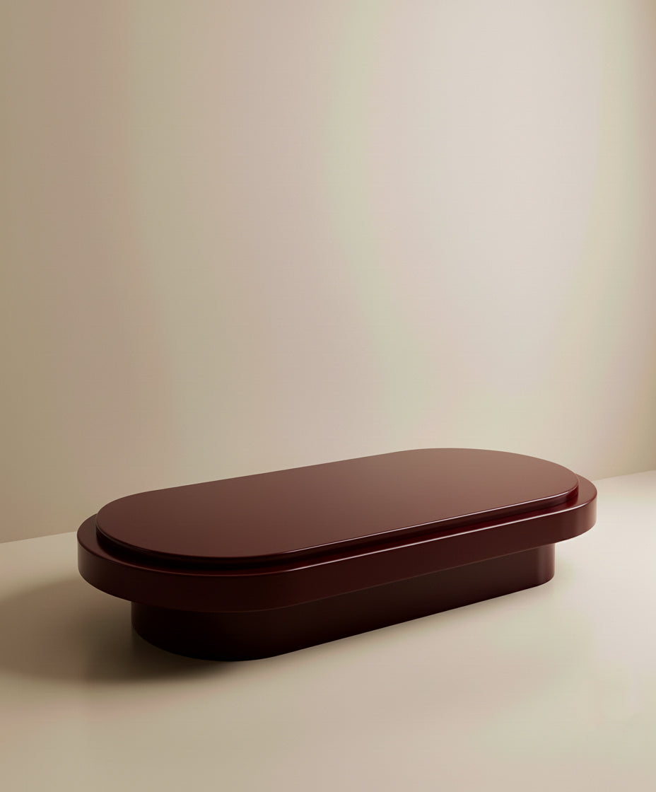 Bordeaux lacquered Mirage table close-up showing deep red wood grain and smooth finish