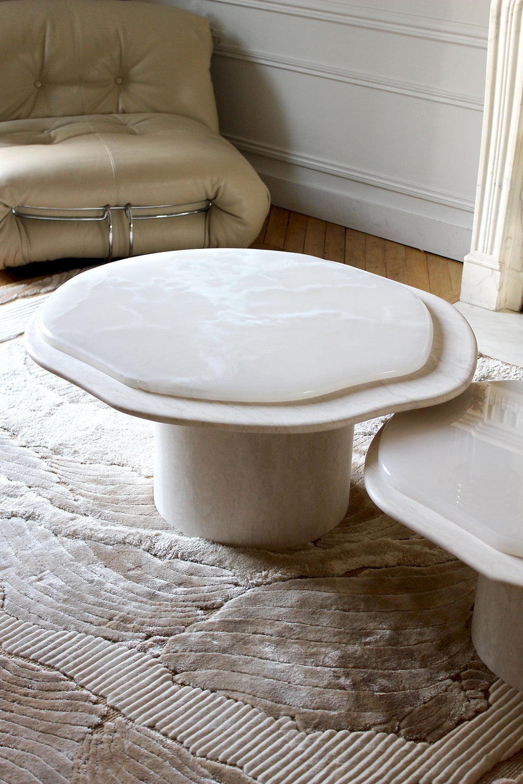 Front angle of Nuga Solo onyx and travertine coffee table, Italian crafted luxury marble furniture