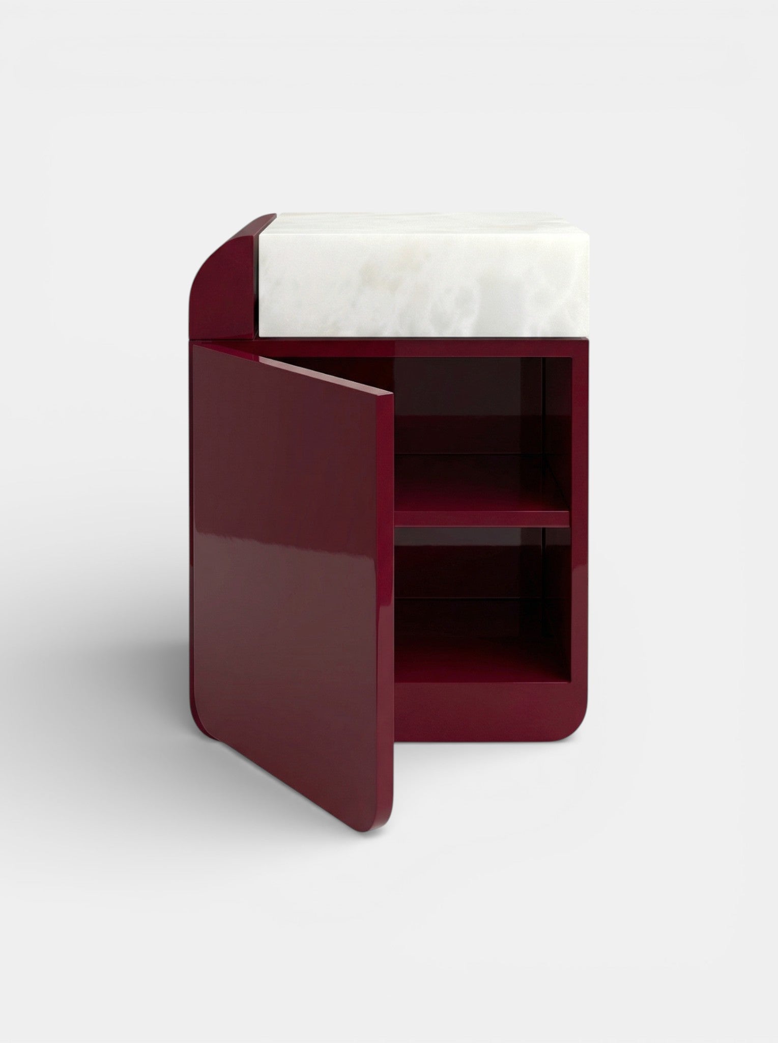 Front view of Amo Bordeaux marble storage table with white onyx base - luxury Italian furniture design