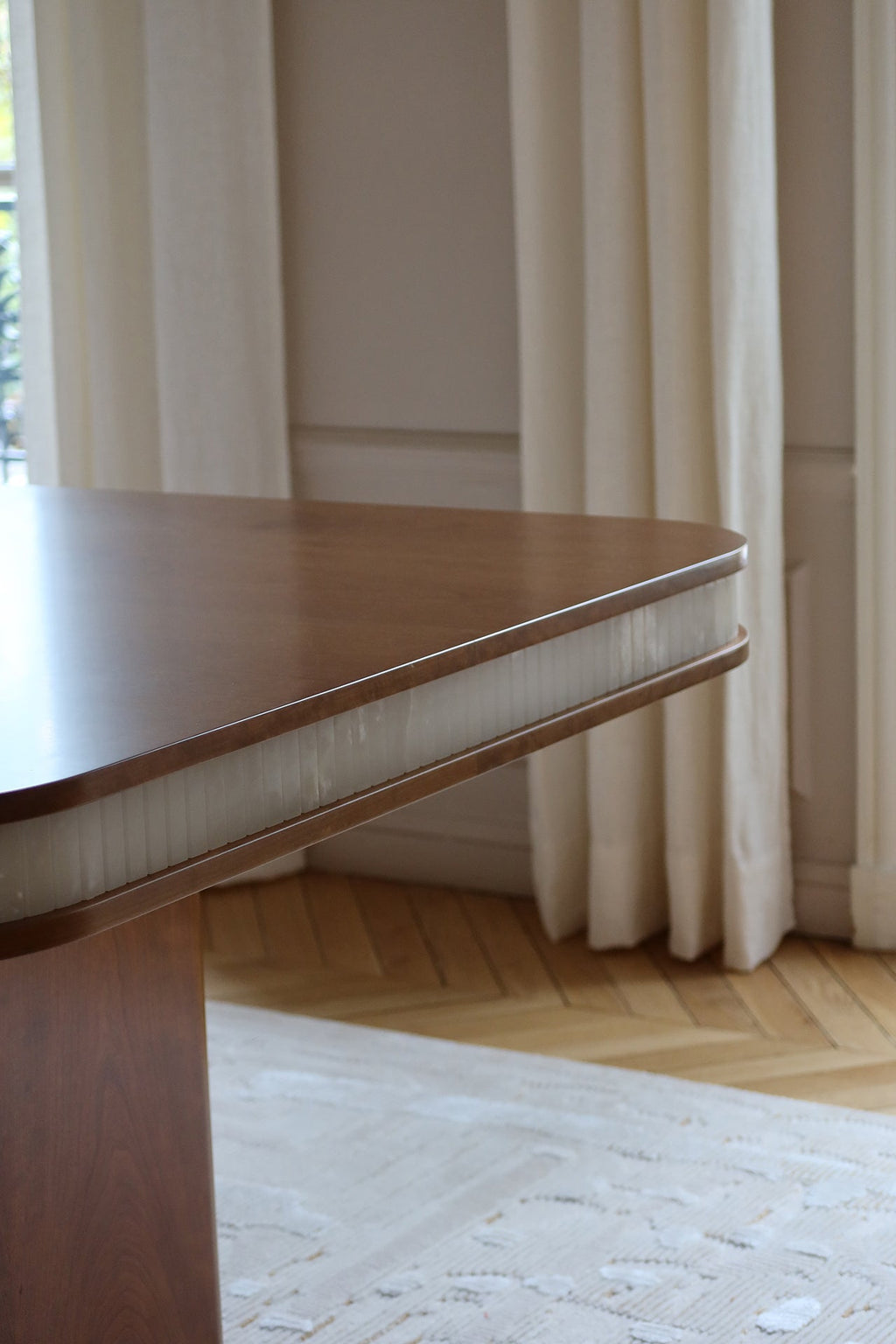 Contemporary Doppio dining table from alternate angle - Italian wood and white onyx luxury furniture
