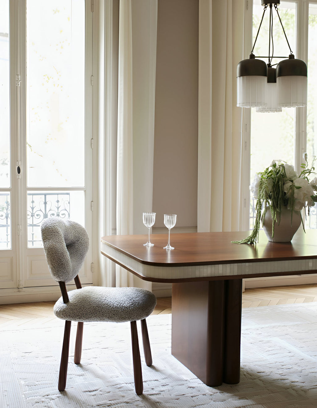Elegant Doppio dining table showcasing wood and white onyx contrast - premium Italian furniture design