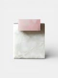 Elegant white and pink onyx marble coffee table with soft rose veining - premium Italian craftsmanship