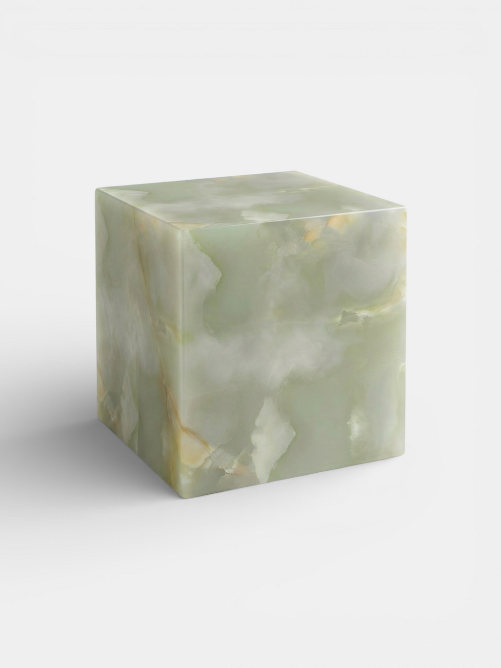 Green onyx cube left side view showing natural marble veining - handcrafted Italian stone furniture