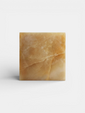 Honey onyx cube minimalist design - Italian luxury marble decor with warm golden tones