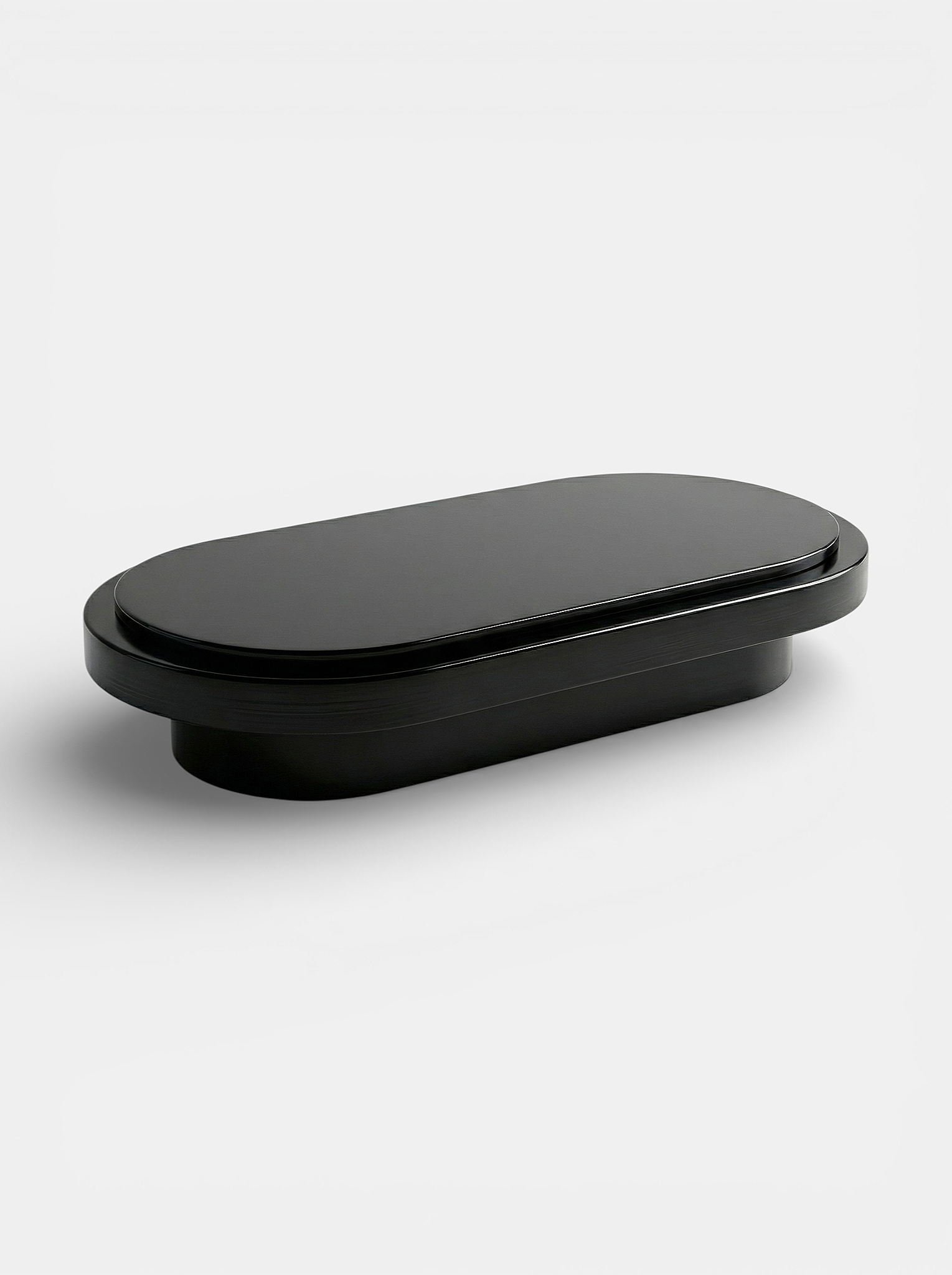 Black lacquered Mirage coffee table left angle view showing glossy finish and curved edges
