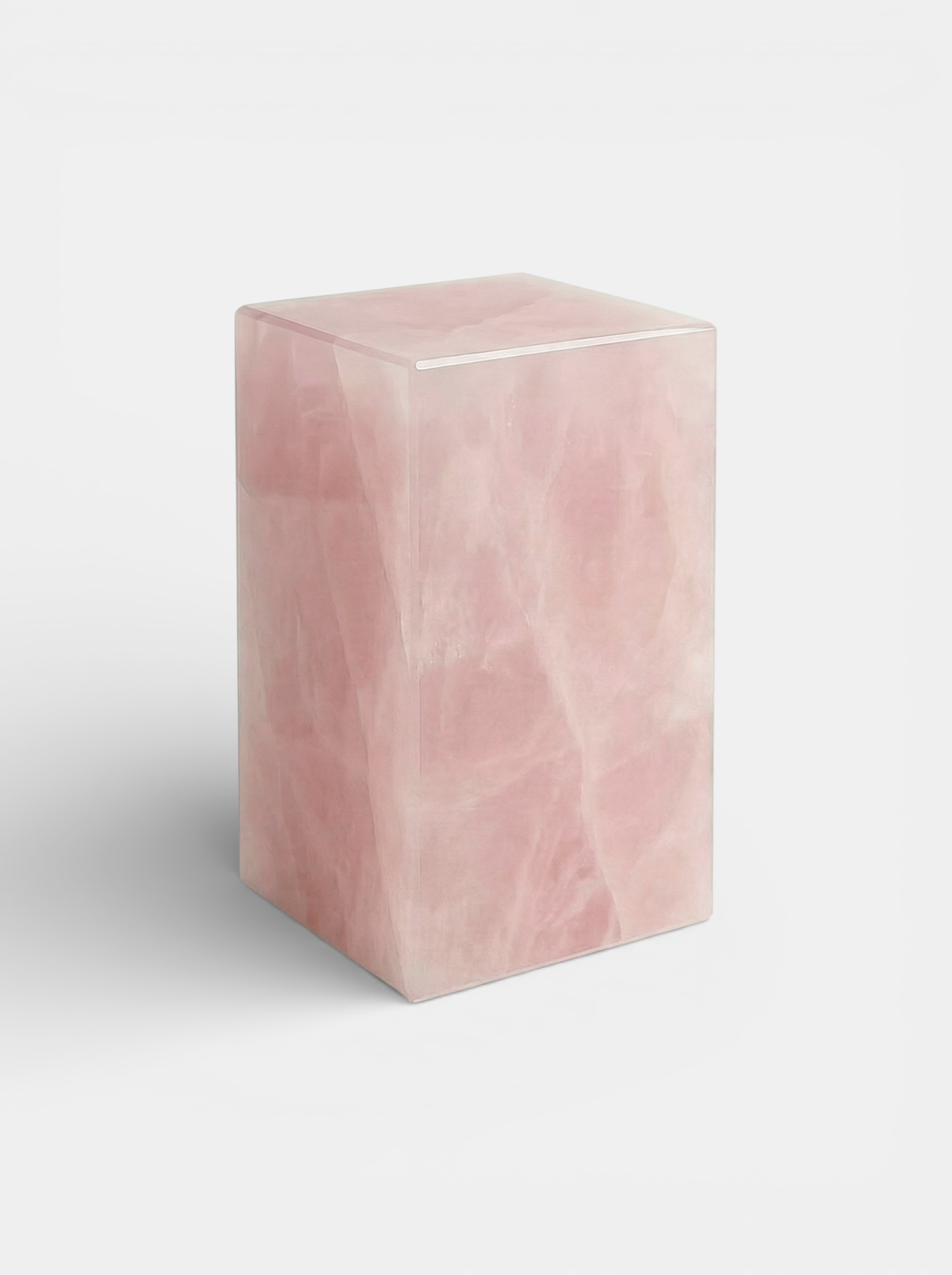 Luxury pink onyx plinth - elegant Italian marble pedestal three-quarter angle studio shot