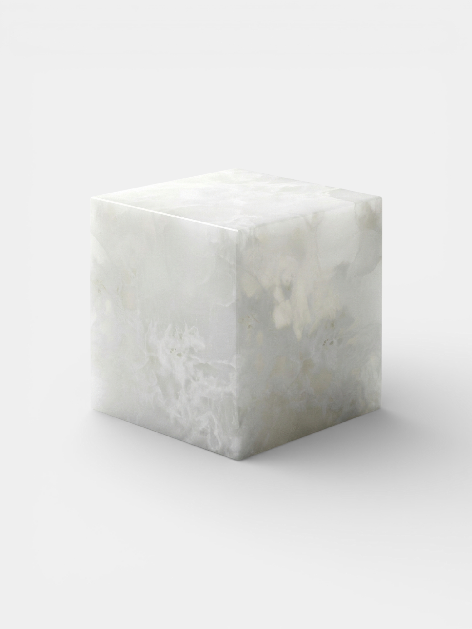 White Onyx cube left perspective displaying luminous marble texture and contemporary minimalist design
