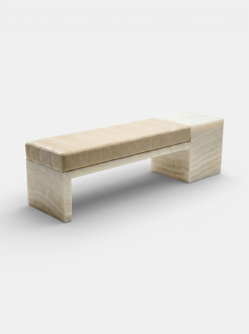 Ivory onyx Meryl bench detail view showcasing marble veining and mohair fabric texture