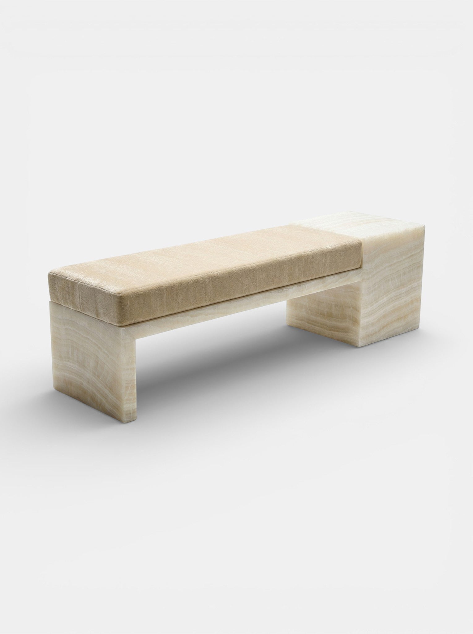 Ivory onyx Meryl bench detail view showcasing marble veining and mohair fabric texture