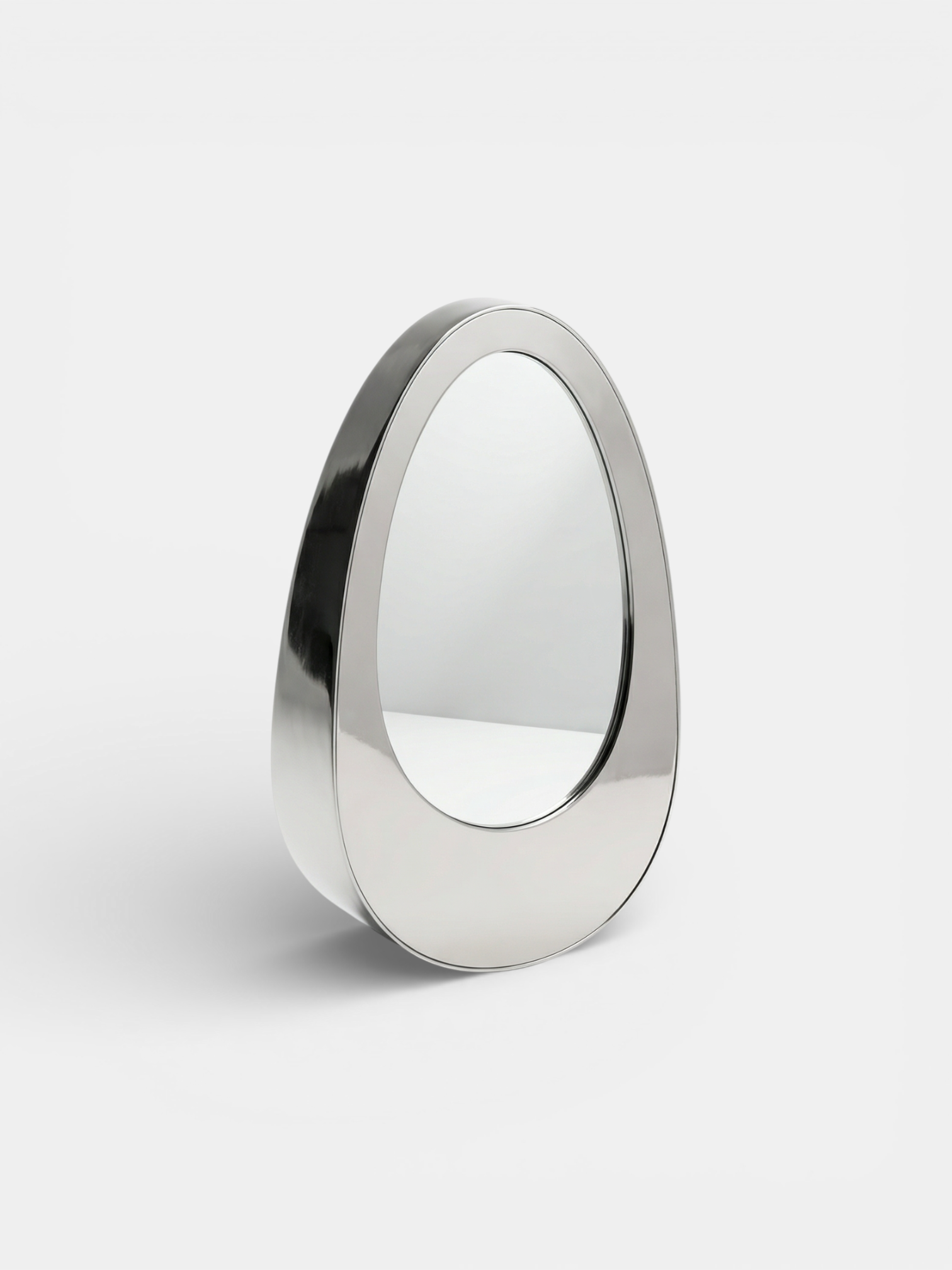 Left 3/4 view of Ovio luxury mirror with marble frame, Italian crafted decorative furniture piece