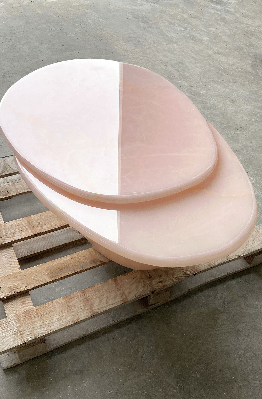 Contemporary Nuga table pink onyx marble - premium Italian design sophisticated studio shot