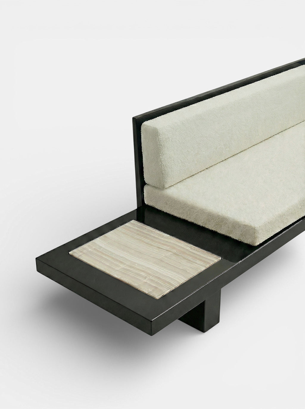 Elegant black ivory onyx Phoebe bench - premium Italian marble furniture side angle studio shot