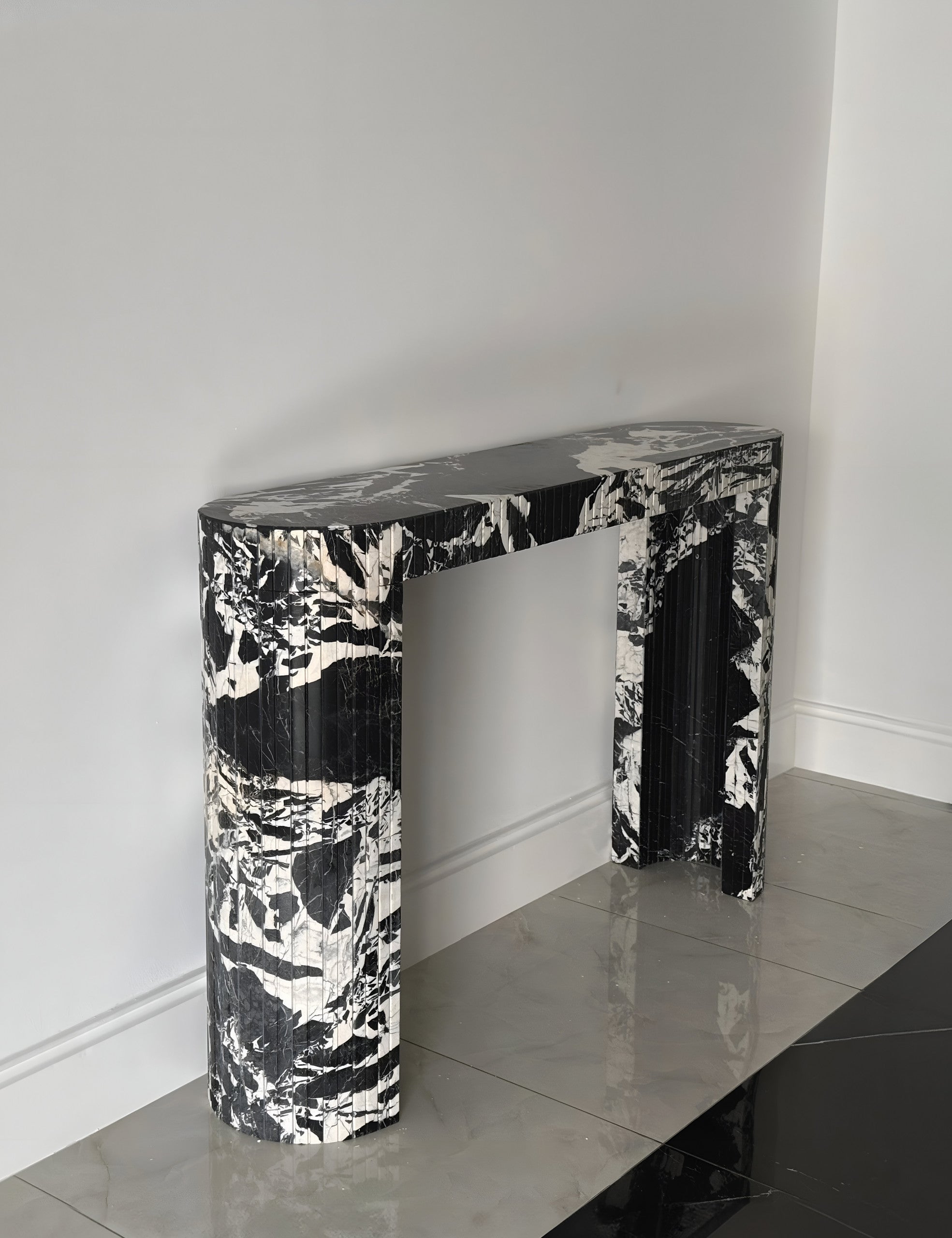 Luna Grand Antique marble console detail view highlighting rich dark marble texture and veining