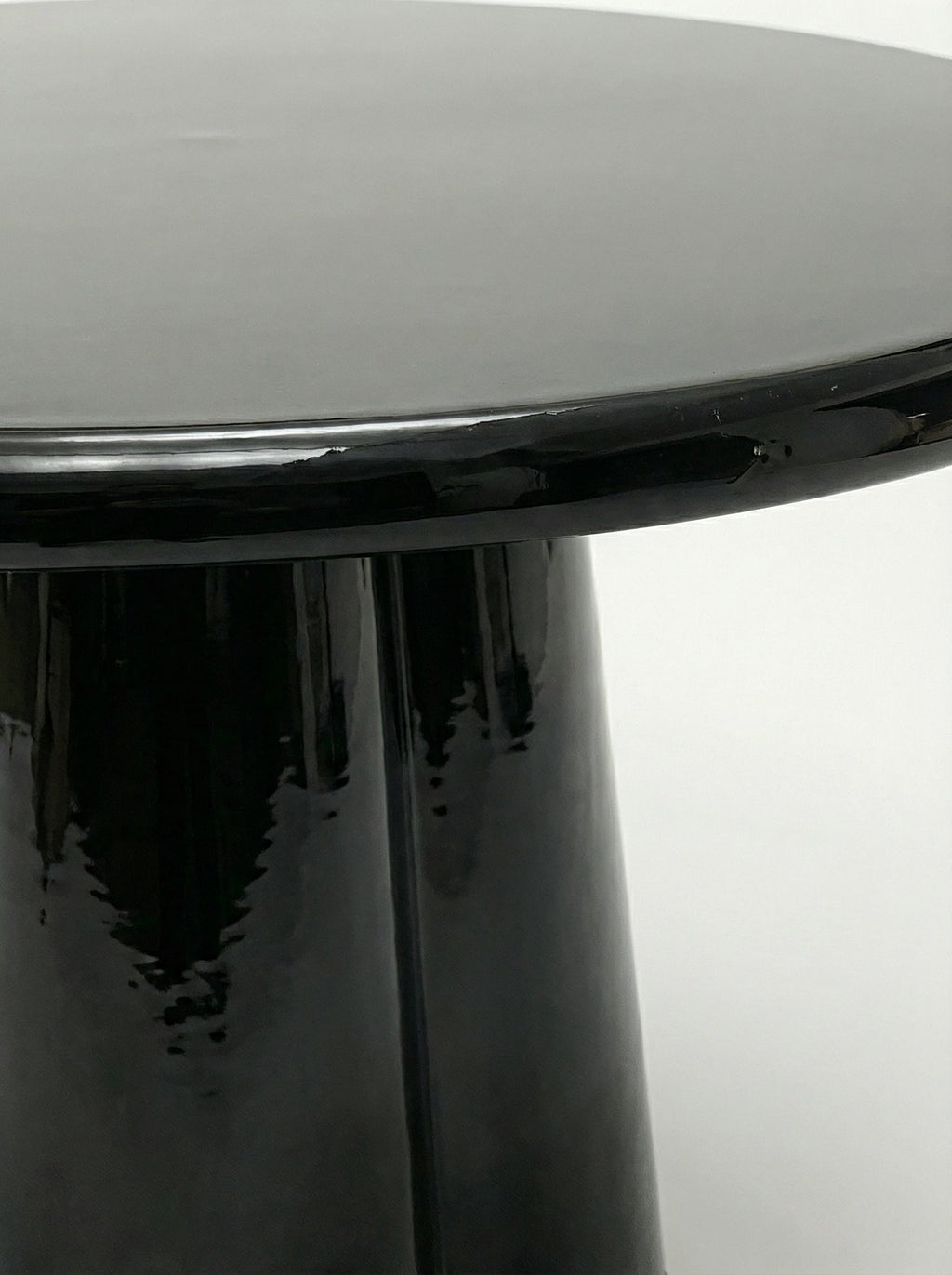 Elegant Poli black lacquered marble - handcrafted Italian furniture surface detail close-up view