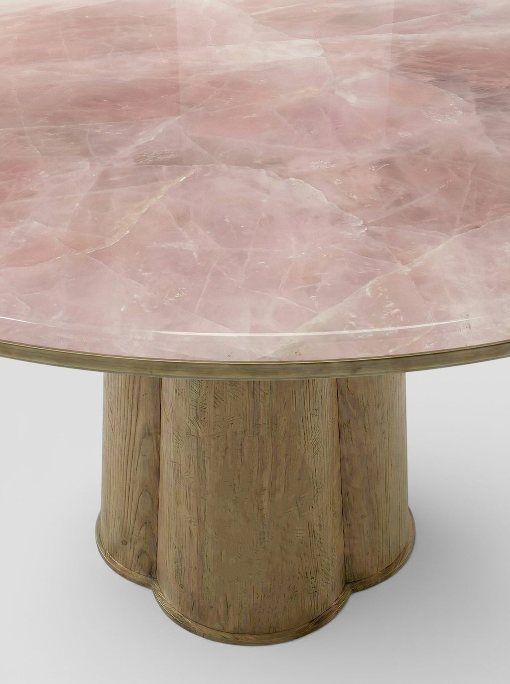 Alternative view of Poli oak and pink onyx table showcasing natural marble patterns and wood grain