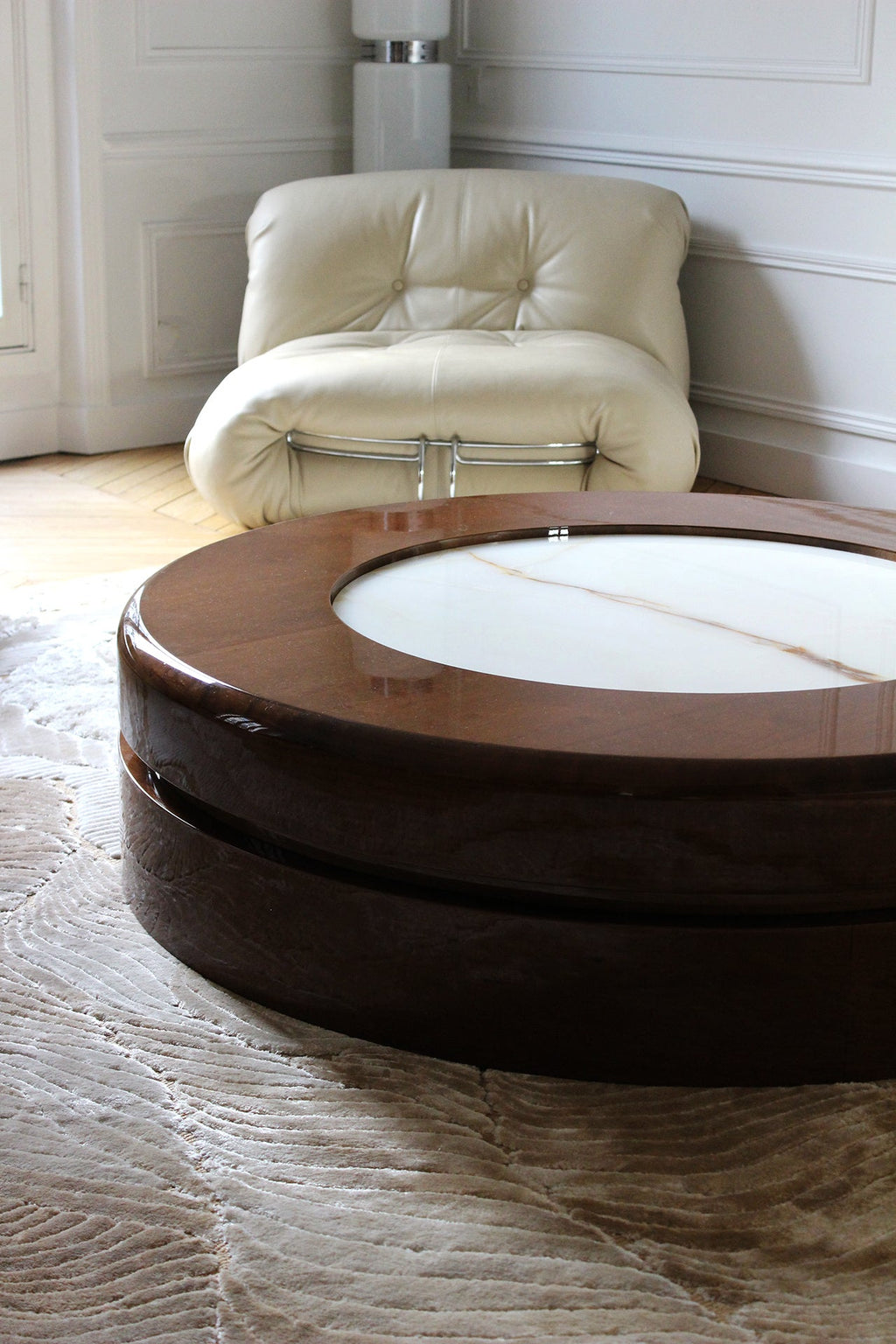 Detail view of translucent Shell onyx marble showing natural fossil patterns - luxury furniture