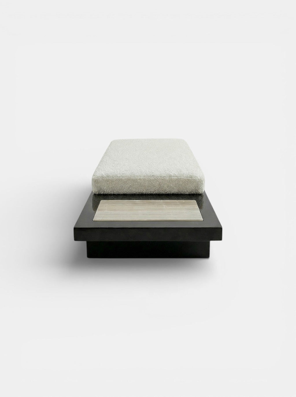 Detail angle of Sybille black ivory onyx bench revealing natural stone patterns and expert craftsmanship